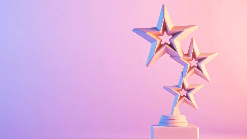 three-star-trophy-award-on-gradient-pink-background