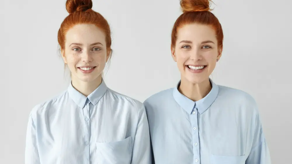 two-young-redhead-caucasian-females-looking-alike-2025-10-14-21-28-17-utc