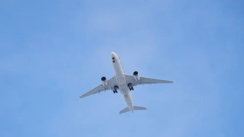 plane-in-blue-sky-2025-01-08-04-40-51-utc