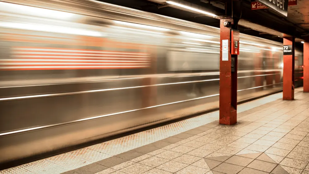 speeding-subway-train-through-terminal-2025-01-09-01-09-18-utc