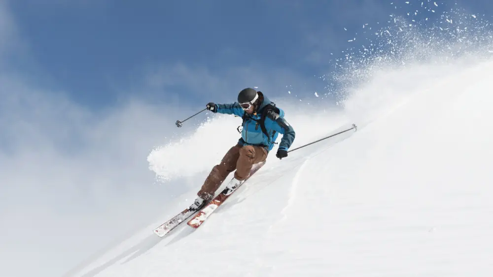 austria-arlberg-man-skiing-downhill