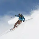 Skier slips, dangles from lift chair in California