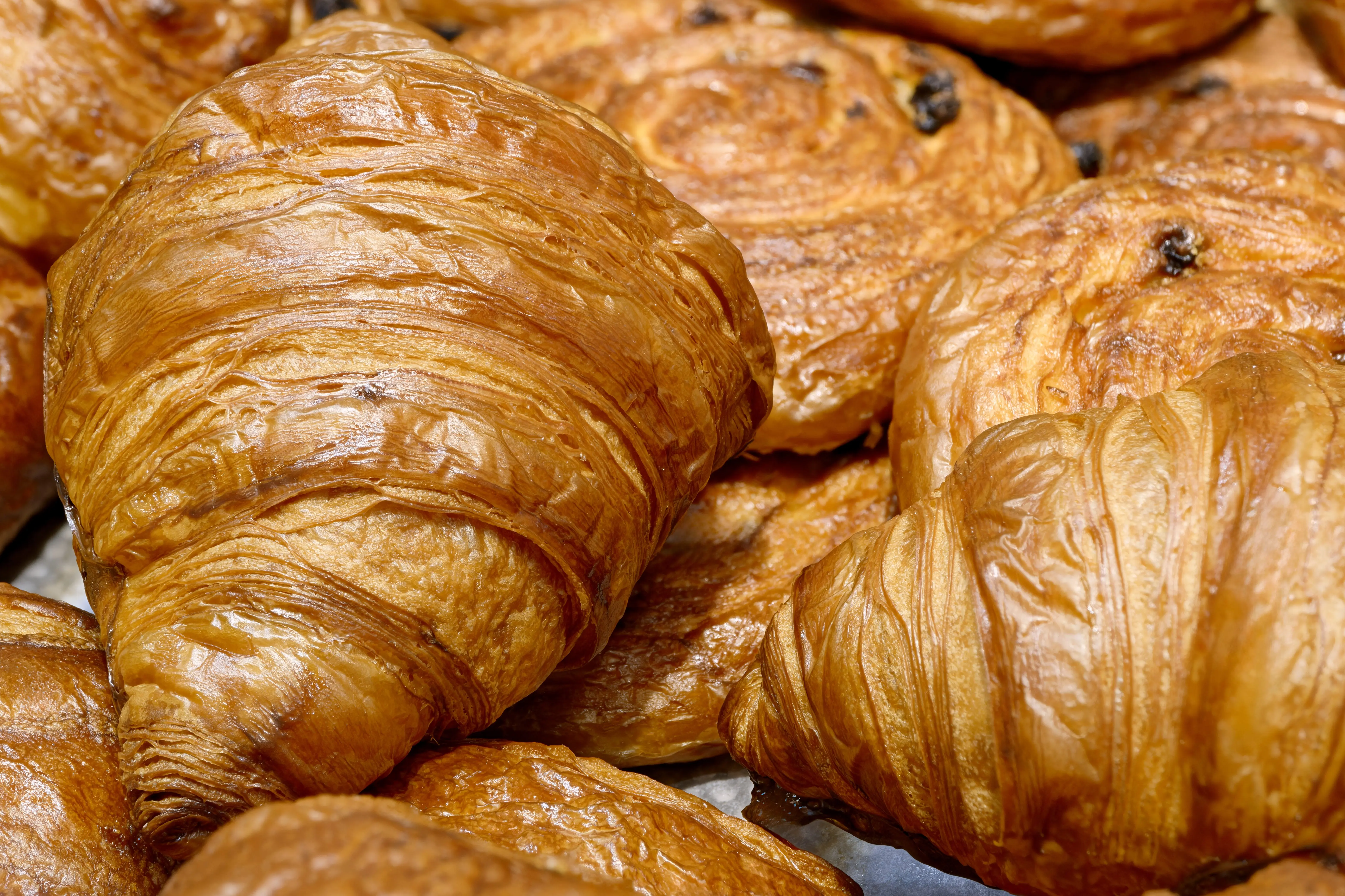various-types-of-traditional-pastries-made-from-puff-pastry-croissants-and-buns-with-raisins