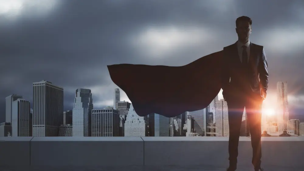 businessman-with-red-hero-cape-standing-on-rooftop-2026-03-26-05-28-41-utc
