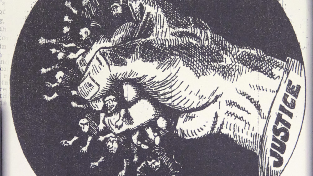 Political Cartoon from 1908 depicting rioters being crushed by a fist of justice Credit: Trent R Nelson for the photo, Illinois State Journal for the cartoon