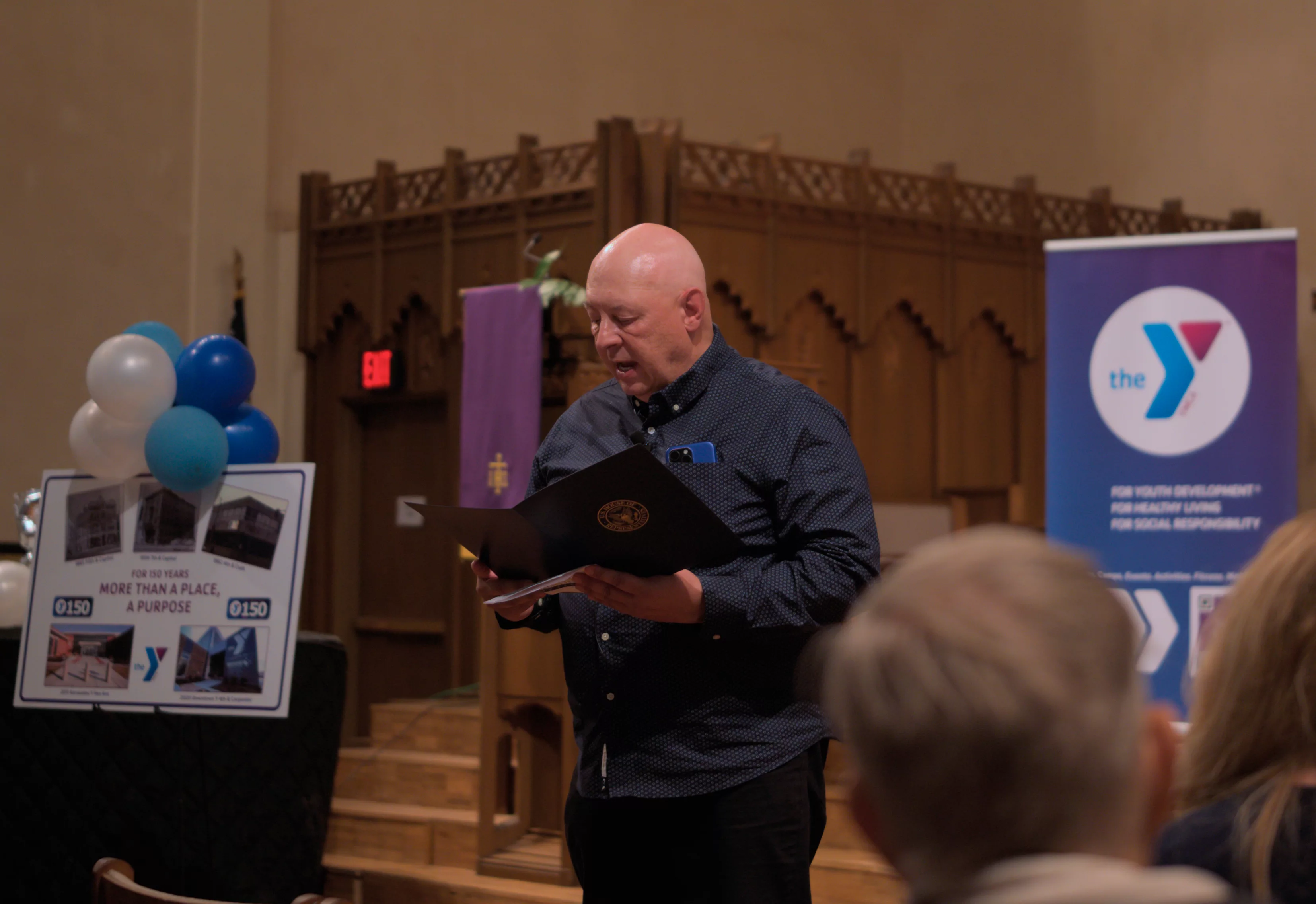 Lou Bart, Springfield YMCA Communications Director, speaking at the First Presbyterian Church of Springfield