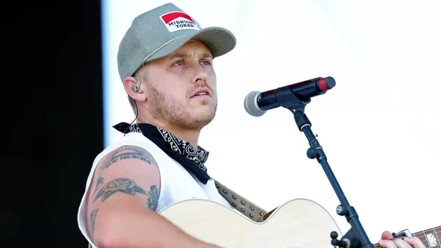 getty_coreykentwhitetanktop385855