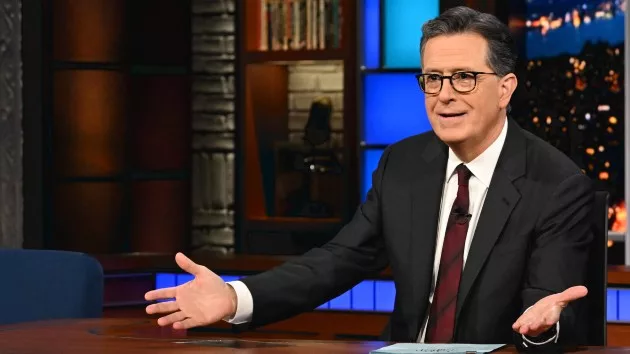 e_colbert_desk_scott_scott_kowalchyk_cbs_12122023516638