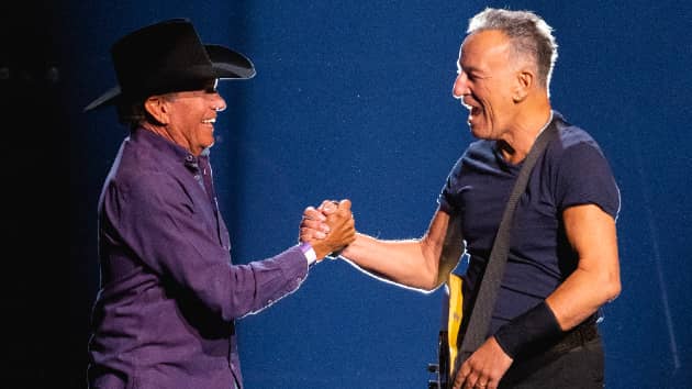 getty_straitspringsteen_021723629770