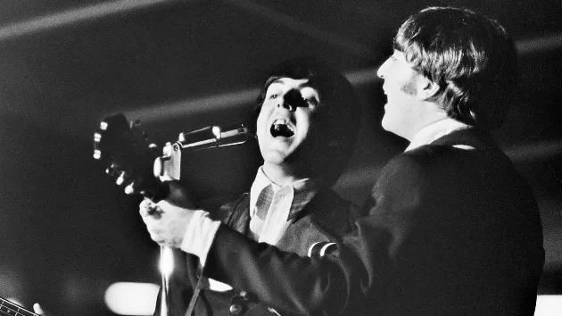 getty_paulandjohnbeatles_11092357526