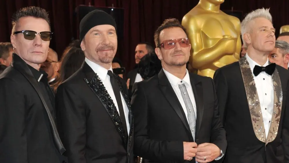 U2 with Bono & The Edge at the 86th Annual Academy Awards at the Hollywood & Highland Theatre^ Hollywood. LOS ANGELES^ CA - MARCH 2^ 2014