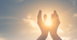 womanhandsholdingthesunatdawn-freedomandspirituality