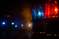 policecarblueandredroundvintagesirenindark