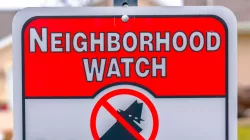 panoramaframecloseupofaneighborhoodwatchsignagainst