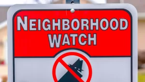 panoramaframecloseupofaneighborhoodwatchsignagainst