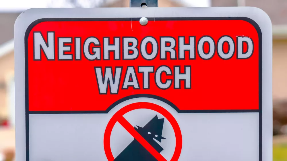 panoramaframecloseupofaneighborhoodwatchsignagainst