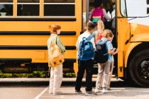 summerholidaysareover-schoolchildrenkidspupilsgroupofmixedrace