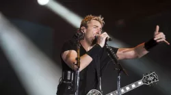 Chad Kroeger^ lead vocalist of the Canadian band Nickelback^ performs during the Rock in Rio 2013 concert^ on September 20^ 2013 in Rio de Janeiro^ Brazil.