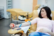 youngwomangivingherbloodinhemotransfusioncenter