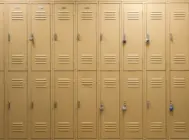 facadeviewoflockersinschoolgympaintedinlight