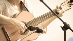 Woman with guitar/toned photo