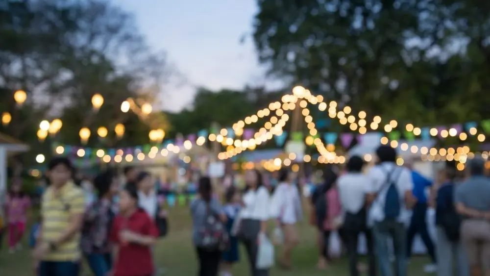 abstractblurpeopleinnightfestivalcityparkbokehbackground