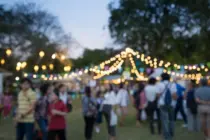 abstractblurpeopleinnightfestivalcityparkbokehbackground