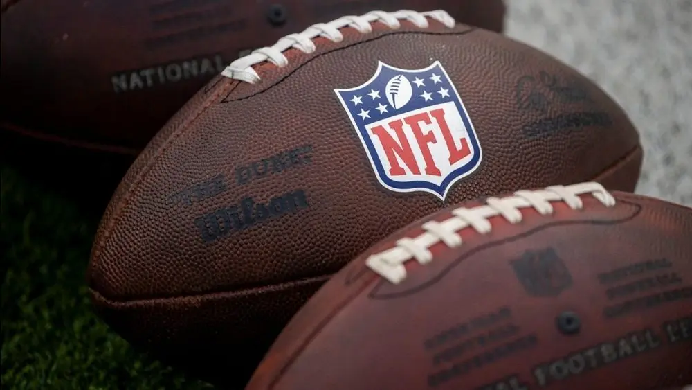 NLF footballs are displayed before an NFL football game between the Los Angeles Rams and the Seattle Seahawks at SoFi Stadium Sunday Nov. 16^ 2025^ in Inglewood^ Calif.