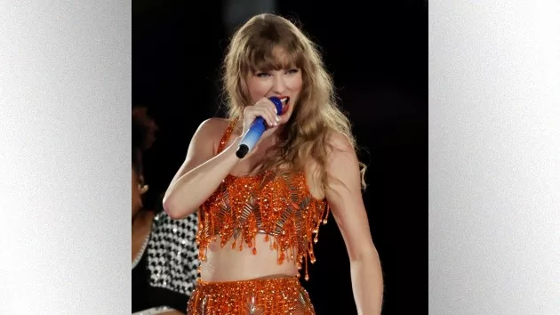 getty_taylorswiftinorange_030724259100