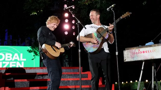 getty_edsheeranchrismartinglobalcitzen_093024449038