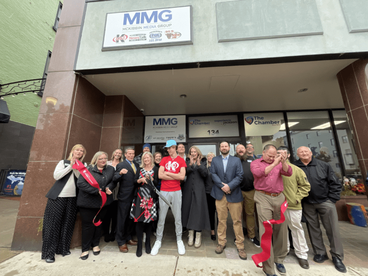 Local radio group kicks off downtown presence with ribbon cutting