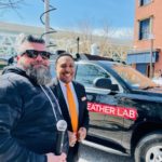 Tim Williams from WJZ-TV broadcasting live from their Mobile Weather Lab with Huber.
