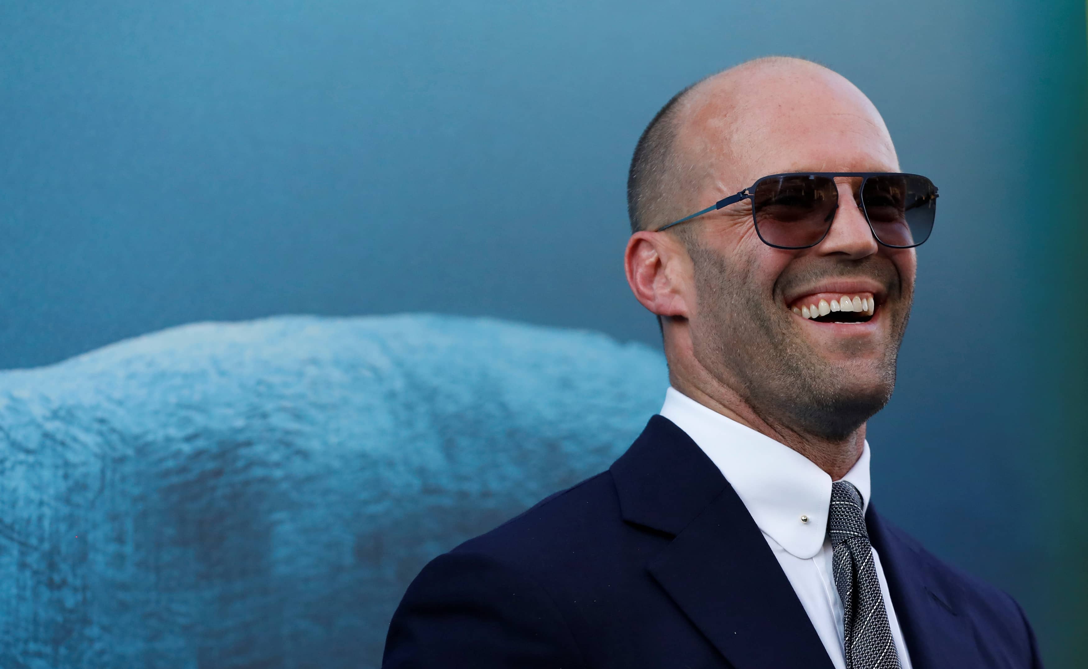 cast-member-statham-poses-at-the-premiere-for-the-meg-in-los-angeles