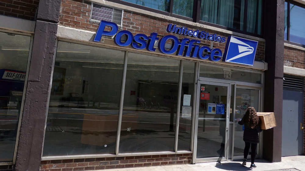 file-photo-a-person-enters-a-united-states-postal-service-post-office-in-manhattan-new-york-city