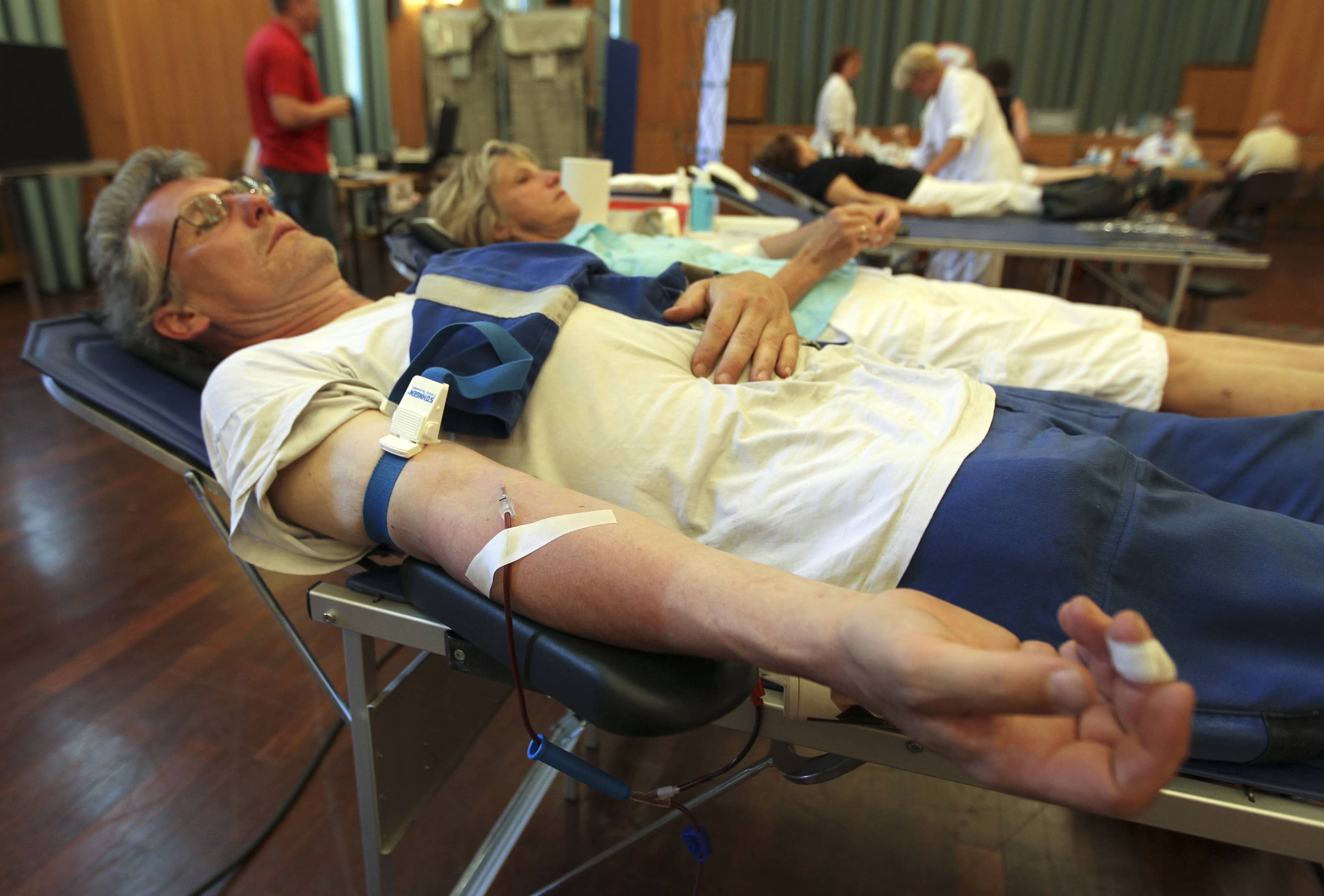 people-donate-blood-at-a-blood-drive-of-the-german-red-cross-in-berlin