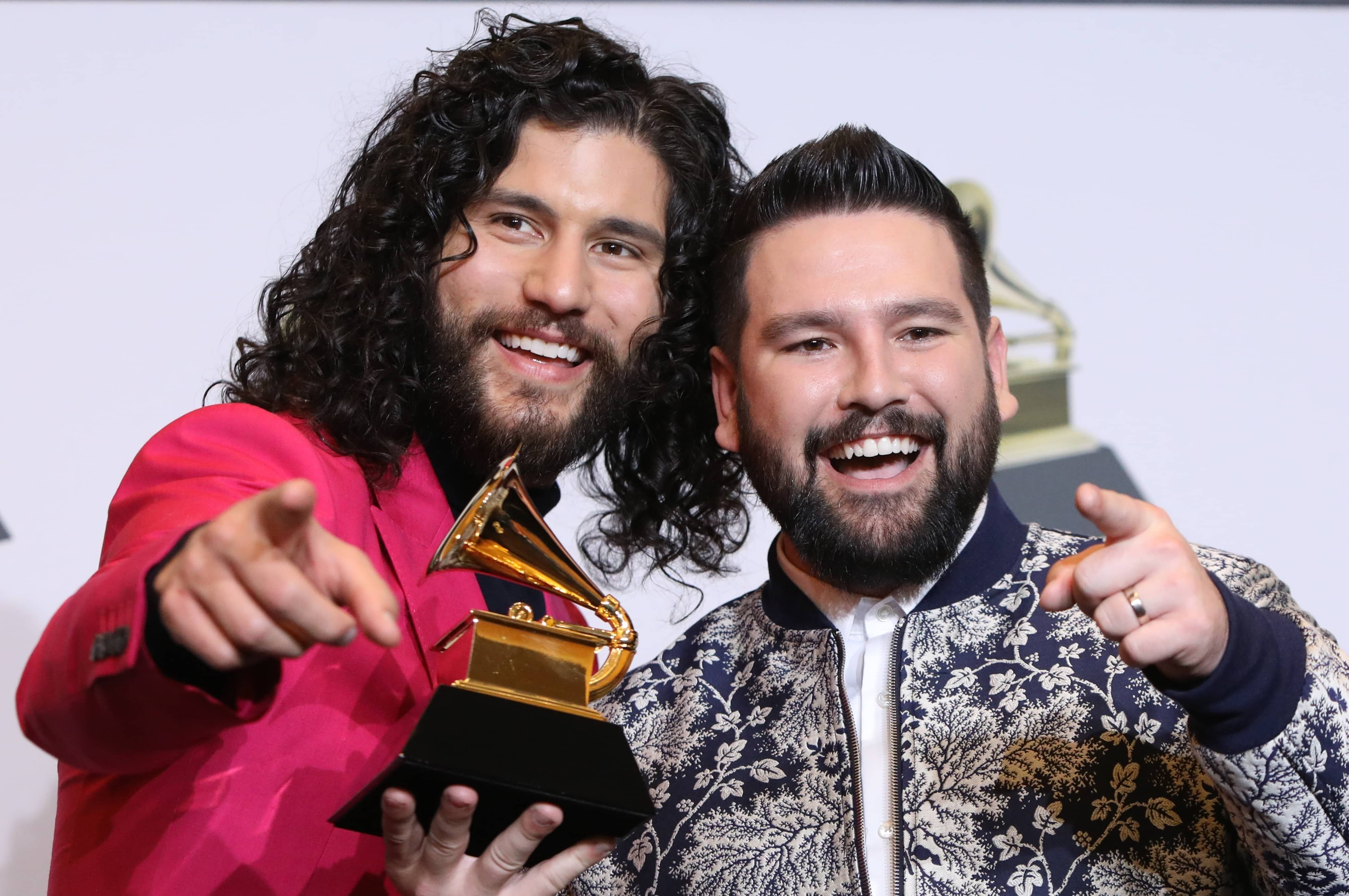 62nd-grammy-awards-photo-room-los-angeles-california-u-s-january-26-2020-dan-shay-pose-backstage-with-their-best-country-duo-group-performance-award-for-speechless