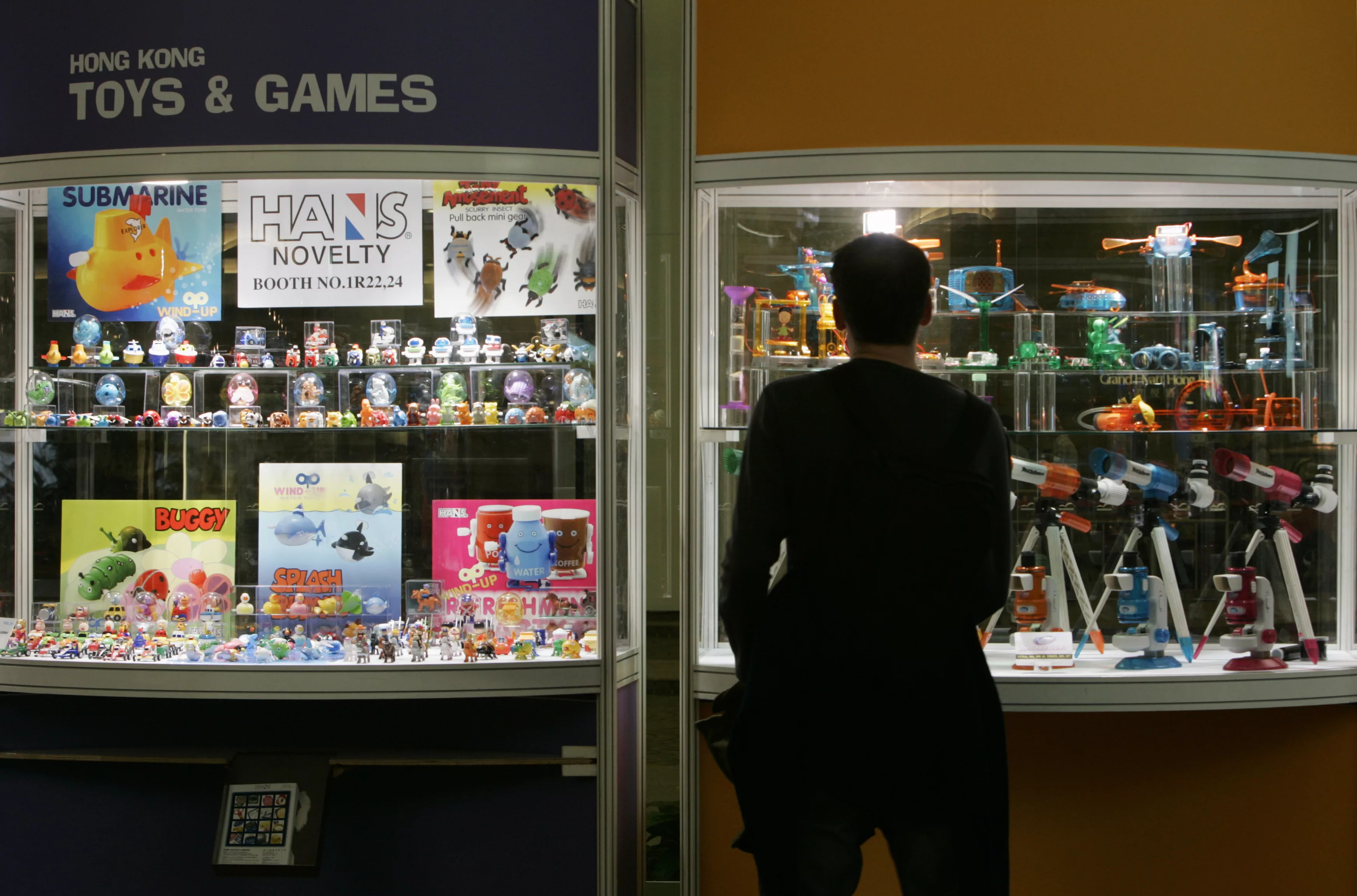 a-visitor-looks-at-products-being-displayed-at-the-annual-toys-games-fair-in-hong-kong