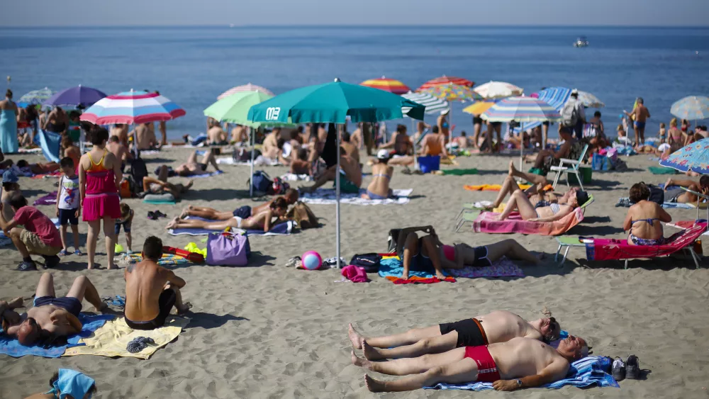 people-sunbath-at-ostia-beach-west-of-rome