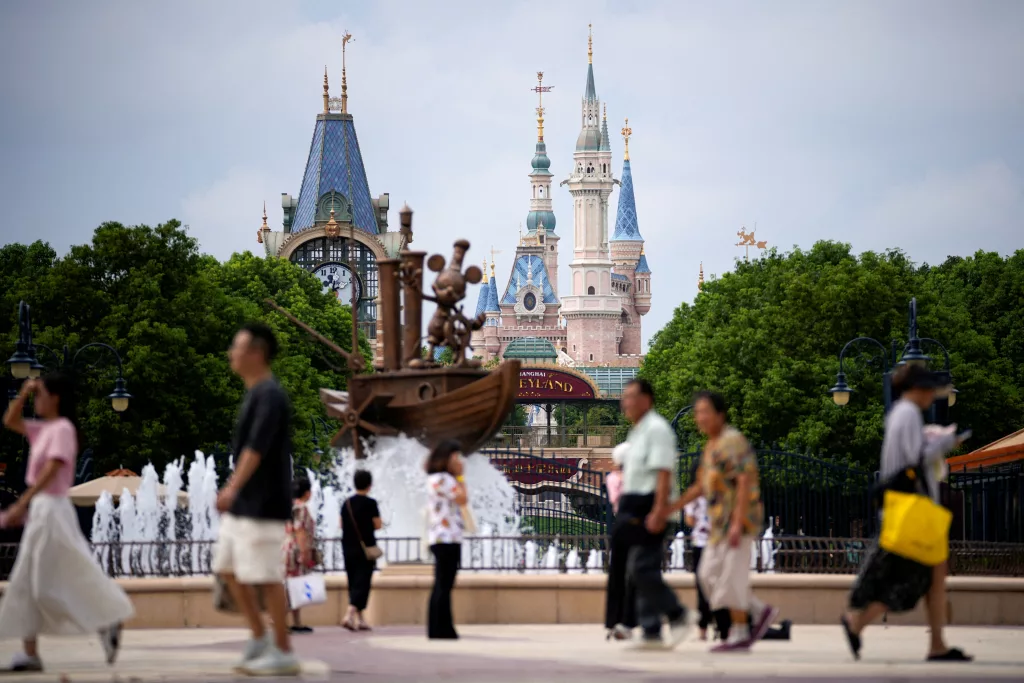 file-photo-people-visit-shanghai-disney-resort-during-a-media-preview-of-the-worlds-first-zootopia-themed-land-in-shanghai
