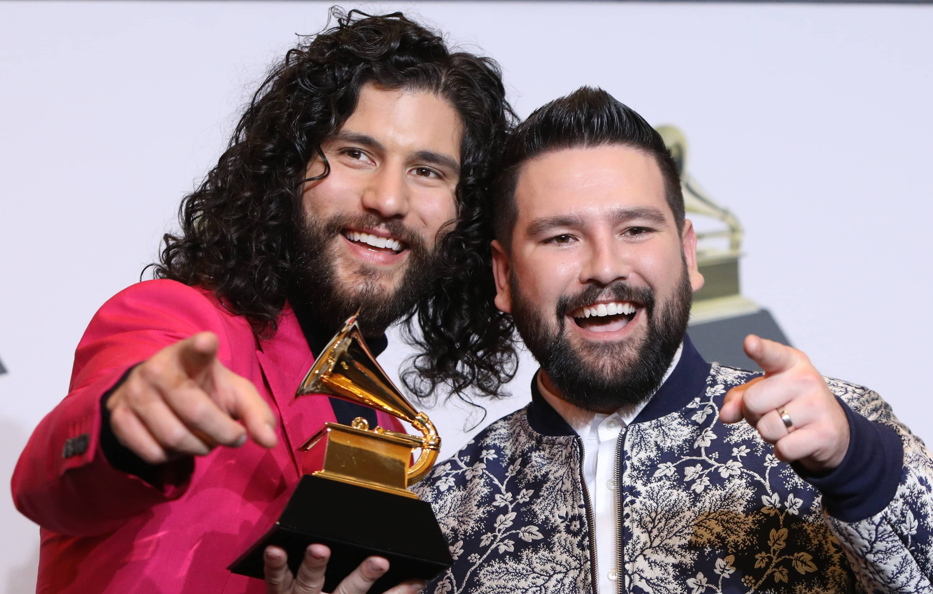 62nd-grammy-awards-photo-room-los-angeles-california-u-s-january-26-2020-dan-shay-pose-backstage-with-their-best-country-duo-group-performance-award-for-speechless-2