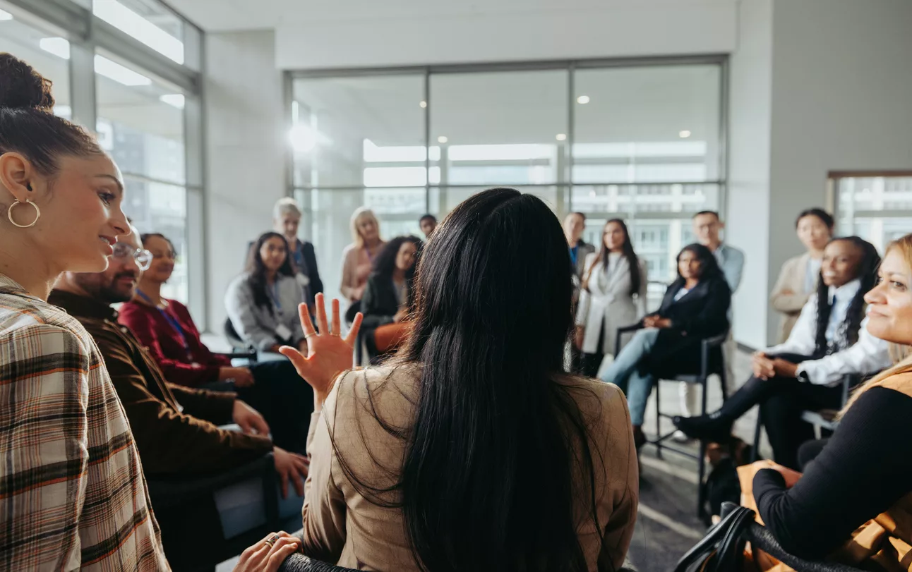 collaborative-team-meeting-coworkers-engaged-in-discussion-in-a-modern-office