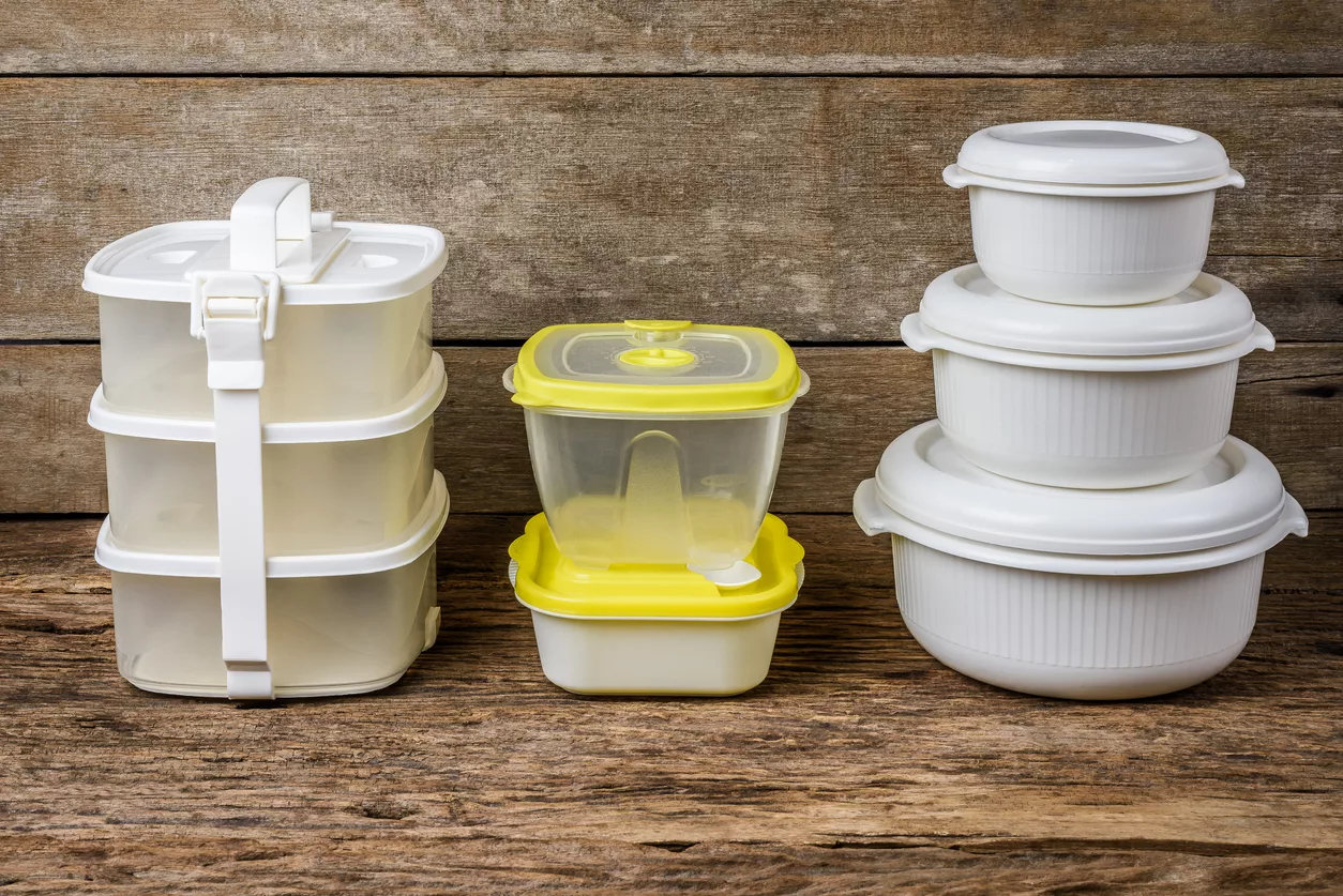 set-of-empty-tupperware-containers-for-food-on-wooden