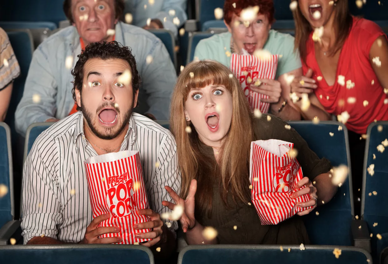 couple-with-scary-expressions-at-the-movies