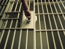 a-man-lockingunlocking-a-prison-cell-door-18