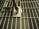 a-man-lockingunlocking-a-prison-cell-door-25