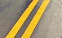 double-yellow-road-stripe-unsplash