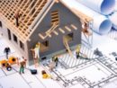 building-house-on-blueprints-with-worker-construction-project