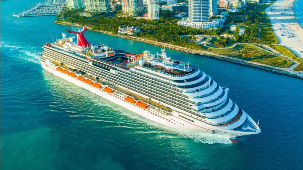 Cruise ship (Carnival Magic) entrance to Atlantic Ocean^ from Miami port.USA. FLORIDA. MIAMI BEACH. DECEMBER^ 2018