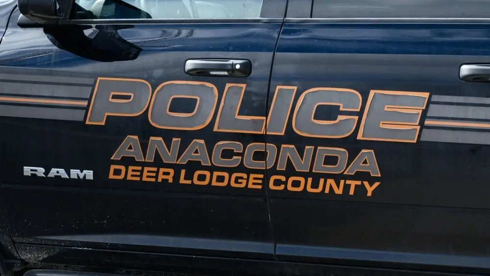 Sign on Anaconda Deer Lodge County police car in closeup. Anaconda^ MT^ USA - May 6^ 2025