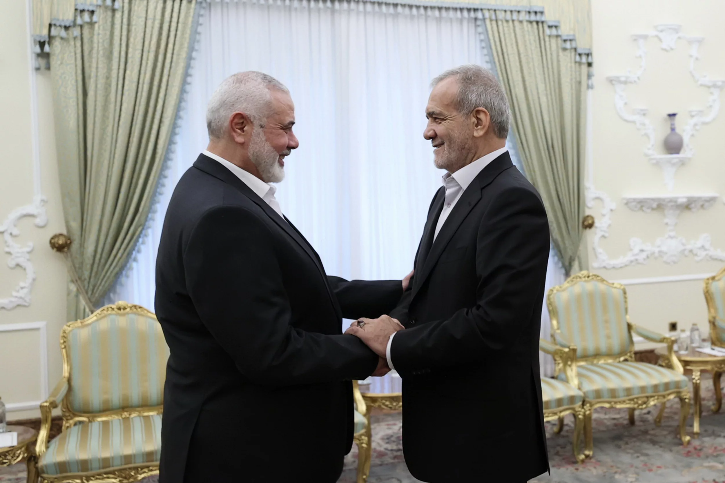 president-masoud-pezeshkian-right-shakes-hands-with-hamas-chief-ismail-haniyeh-ap-jpg-2